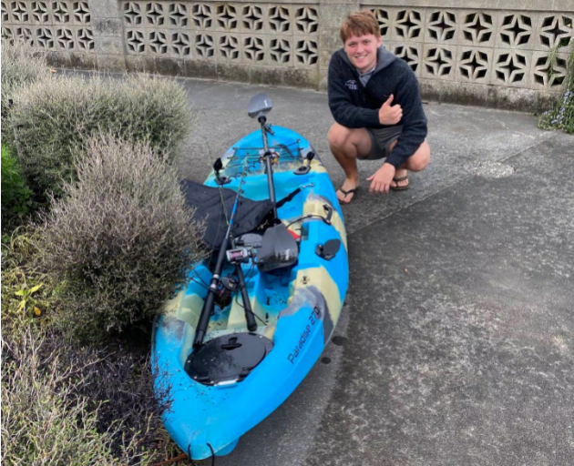 Arnie Cave with his damaged kayak after it washed up on Monday.