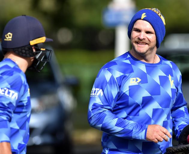 Otago interim coach Ben McCord shares a light moment with his charges during a training session...