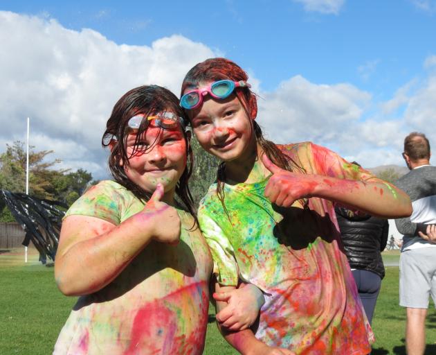 Asha McInnes, 9, and Ayla Linton, 10, both of Cromwell, were well prepared to face the dye.