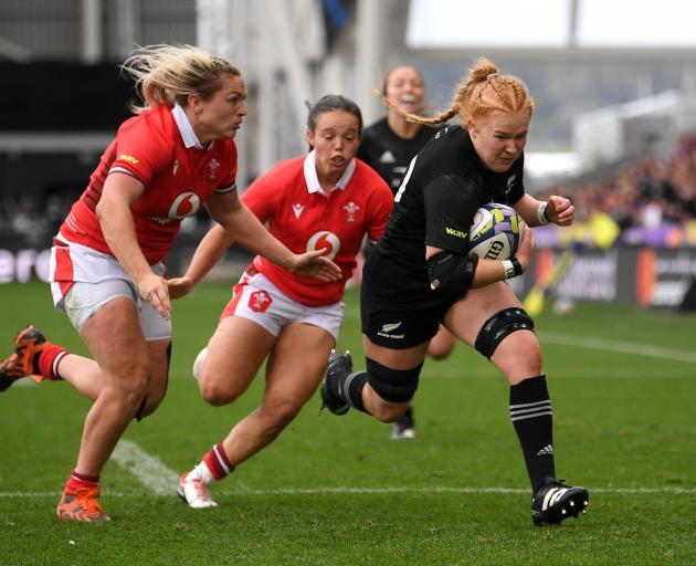 Lucy Jenkins charges towards the try line against Wales during their WXV test at Forsyth Barr...