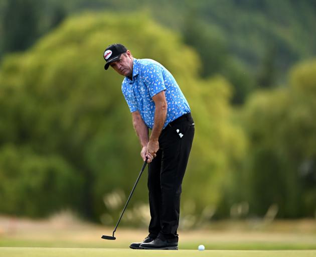 Tournament leader Scott Hend, of Australia, putts.