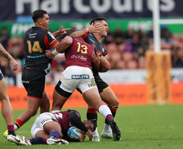 Highlanders centre Tanielu Tele’a received a yellow card — later upgraded to red — for this shot...