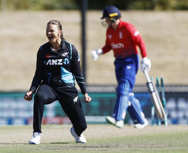 Susie Bates celebrates taking a wicket in the last over of the third T20 International between...