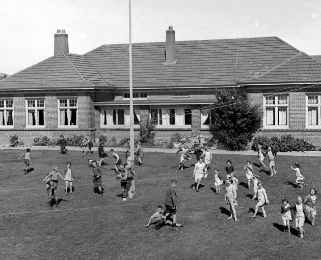 Children playing outside Glendining Presbyterian Children’s Home in1950. PHOTO: Evening Star