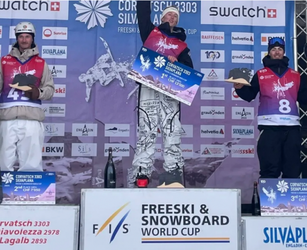Luca Harrington (R) on the podium at the Freeski World Cup in Switzerland, 2024. Credit: Snow...