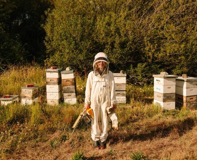 Beekeeper Jessica Curtis, of Cardrona business Branch Creek Honey, which has won three gold...