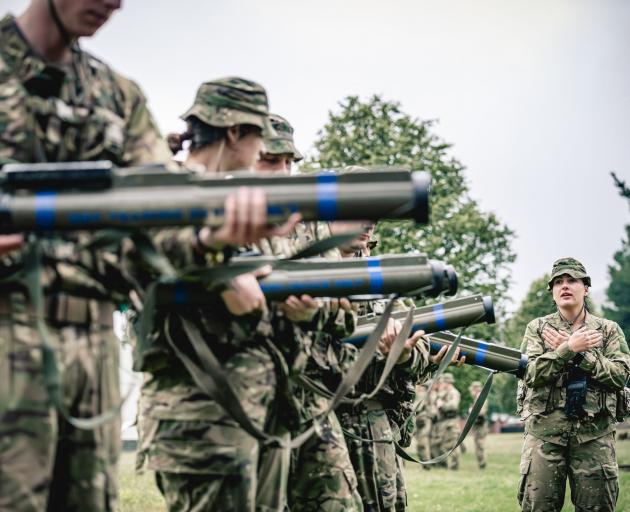 Private Lyndi Le Fay assists with the 66mm short range anti-armour weapon instruction during  New...