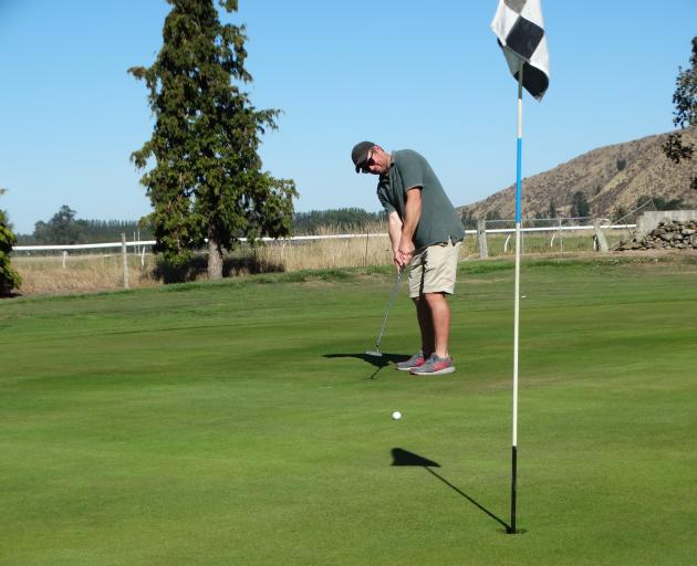 Kurow Rugby Club player Ben Nowell putts during the Whalan Lodge Trust gold day fundraiser at the...