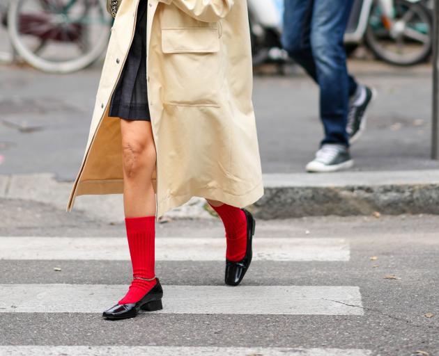 Red socks have caught fire on the fashion scene this year. PHOTO: GETTY IMAGES
