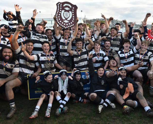 Southern players celebrate winning the banner last year. PHOTO: ODT FILES