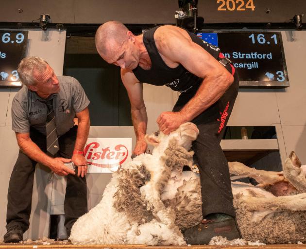 Nathan Stratford, of Invercargill, clips a sheep on his way to winning the National Shearing...