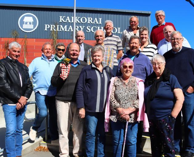 Former classmates gather for a reunion at Kaikorai Primary School recently. PHOTO: SIMON HENDERSON