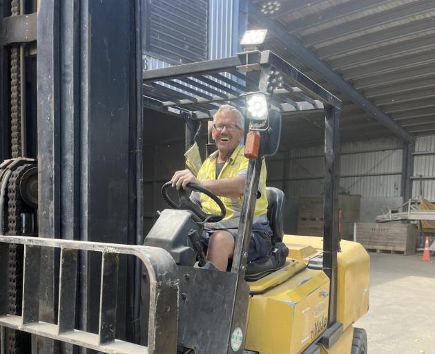 Fred Goodall has a blast shifting onions on a forklift. PHOTOS: SUPPLIED