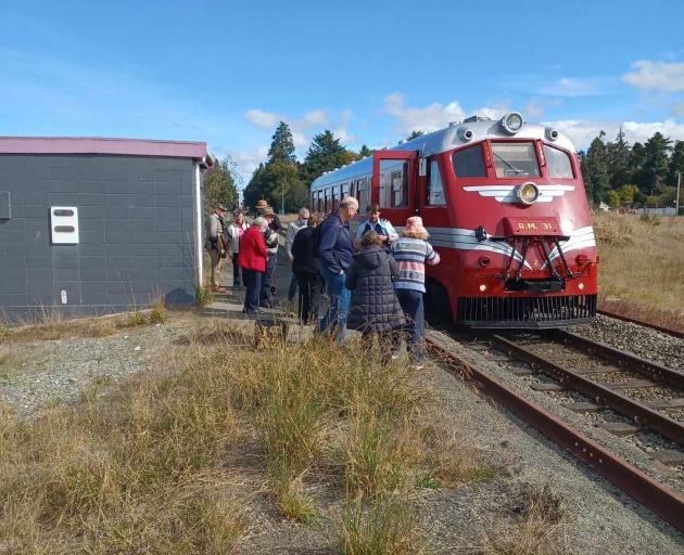Standard railcar Tokomaru chugs to a stop in Orari for the first time in its 86 years.PHOTO:...
