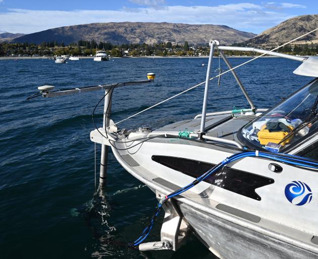 The multibeam echosounder system attached to the bow of the diving vessel Rukuwai II . It is...