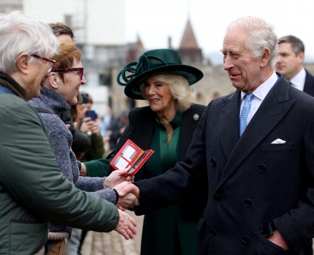 King Charles and Queen  Camilla greet members of the public after attending an Easter Sunday...