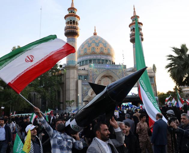 Demonstrators in the Iranian capital, Tehran after the strikes on Israel. Photo: Reuters