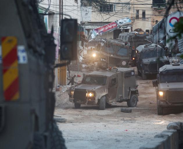 Israeli military vehicles during a raid in Tulkarm in the occupied West Bank. Photo: Reuters 