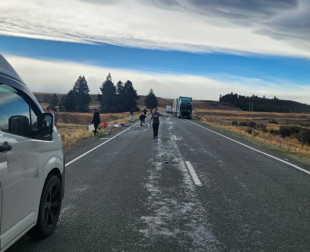 People stop traffic on State Highway 8 near Lake Tekapo following a serious crash this afternoon....