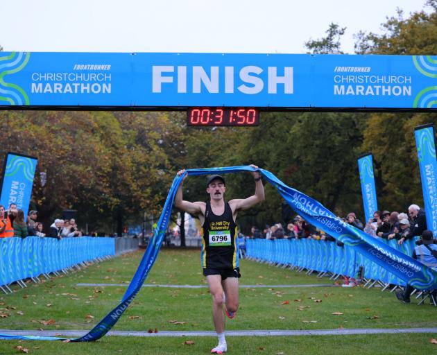 Oli Chignell wins the men’s 10km title at the Christchurch Marathon on Sunday. PHOTO:...