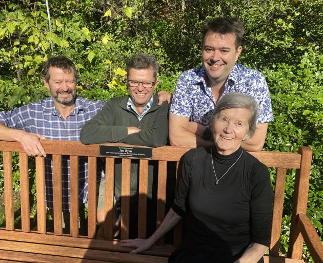 Jim’s widow Irene, watched over by sons, from left, Shaun, Grant and Craig, was first to sit on a...