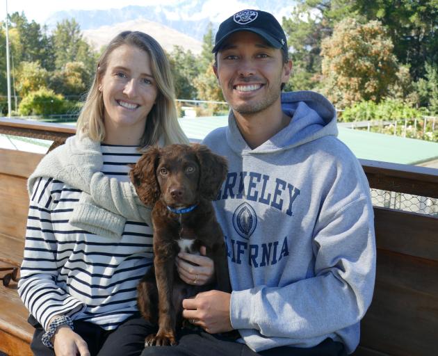 Newly-retired tennis pro Ben McLachlan with his wife Georgia and their new puppy, Milo. PHOTO:...