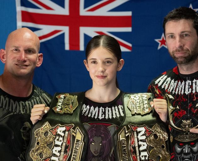 Cromwell athlete Shyla Mulholland, 14, with her martial arts coach Jason Magnago-Smith (left) and...