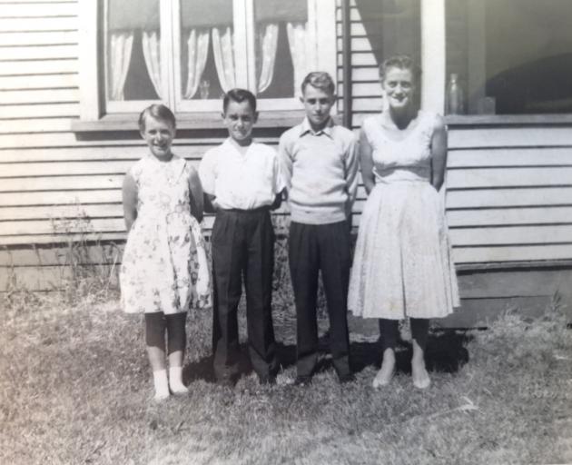 The Biddulph family - Janice, left, with siblings Maurice and Richard, and mother Lotus outside...