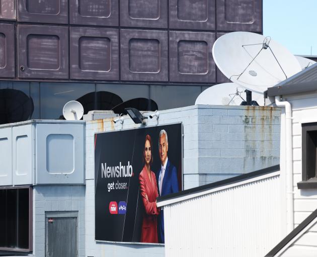 A billboard outside Newshub's headquarters in Auckland showing news presenters Samantha Hayes and...
