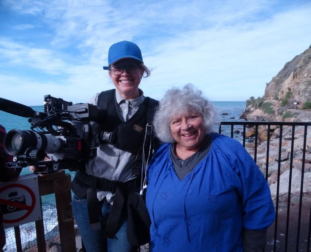 ABC crew member Olivia Peniston-Bird (left) joins Miriam Margolyes at the Oamaru Blue Penguin...