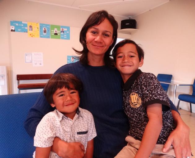 Carissa Samuelu, with her children (left) Quinn, 3, and Ilai, 6, at Reach Church, is happy to...