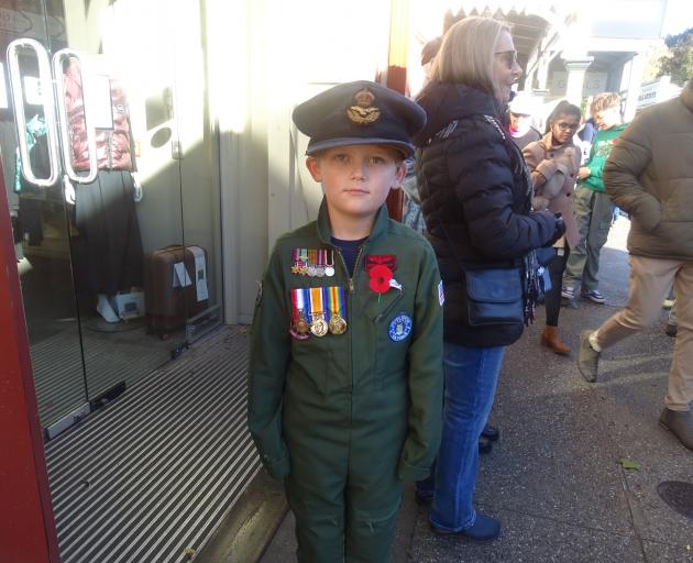 George Larson, 7, of Arrowtown, attended the Arrowtown Anzac Day service wearing his relatives’...