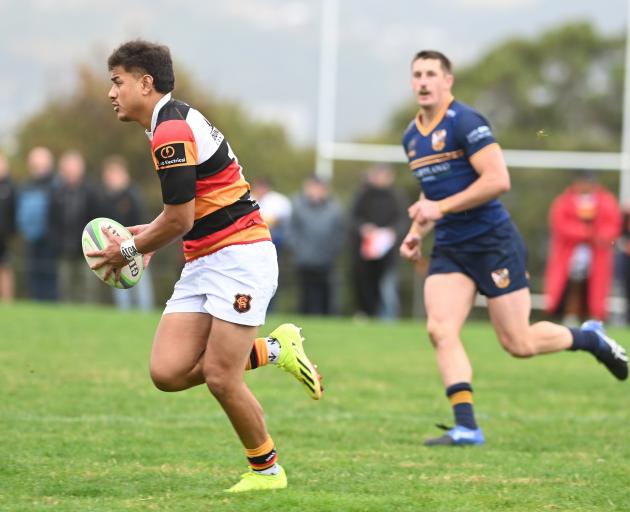 Zingari-Richmond centre, Tama Apineru, looks for an attacking opportunity against Dunedin at...