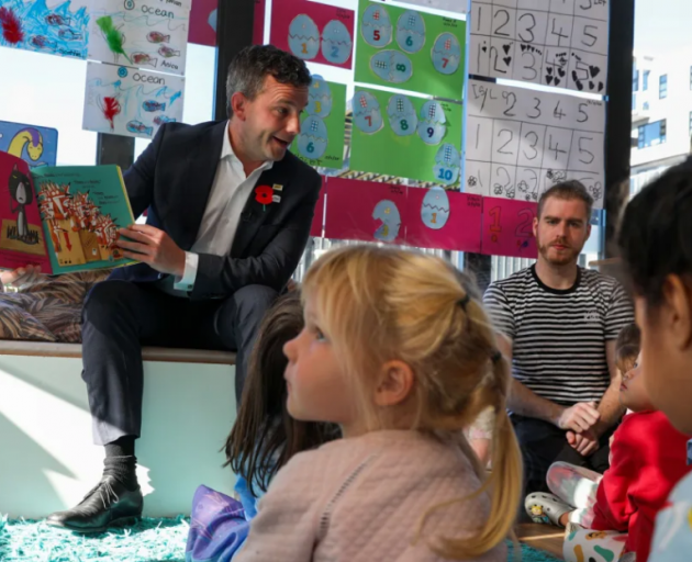 Seymour reads "Oi Frog!" to children at an Early Childhood Education centre in Wellington before...