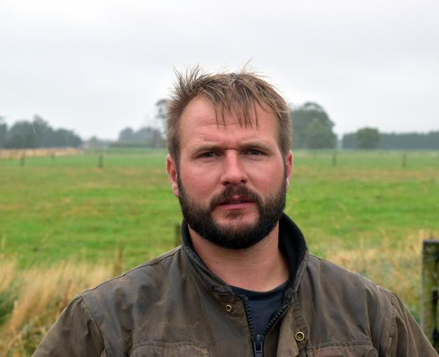Dairy farmer Matt Kerr is using a chemical to control grass grubs on his farm.