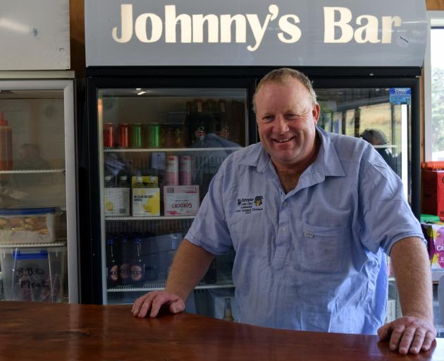 Warepa Collie Club vice-president and barman Johnny Bennett, of Te Houka, has been serving dog...