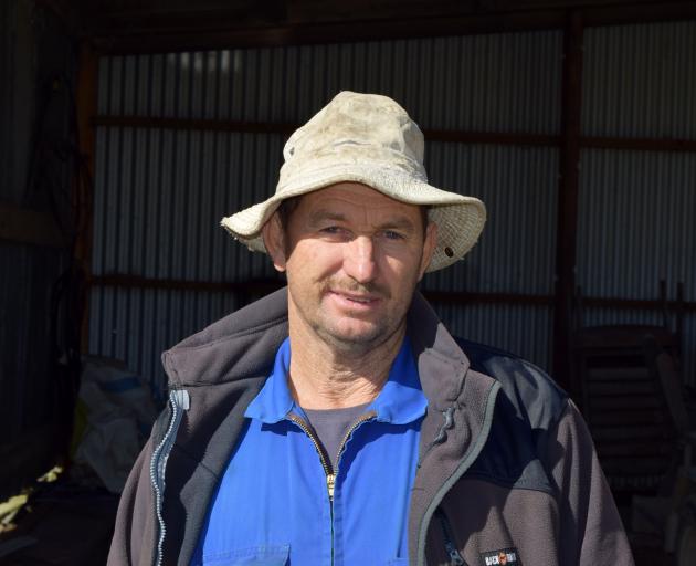Dairy farmer Larry Frost, of Glenore, says installing automatic cup removers is the best...
