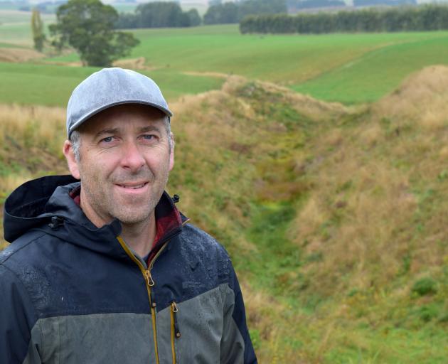 Otago South River Care co-ordinator Craig Simpson, of Mosgiel, in a gully where a drone trial was...