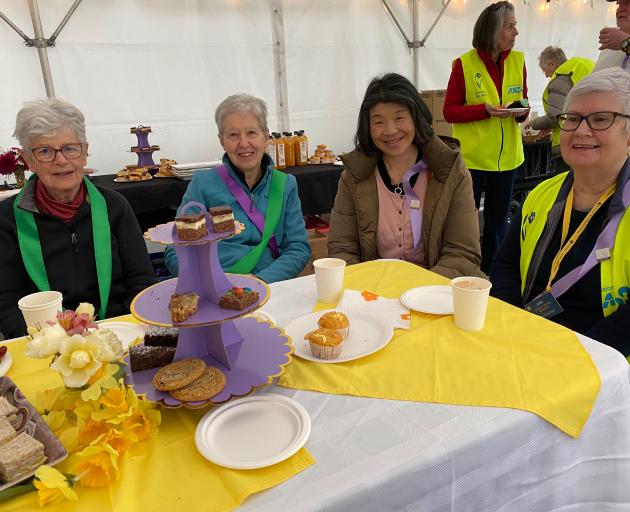 Enjoying morning tea after taking part in the first "Celebration Lap" for people affected by...