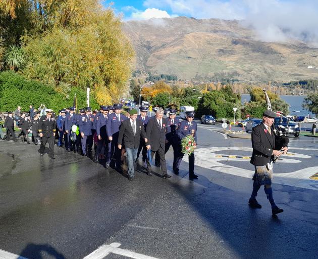 Members of Wānaka service organisations leave the Lake Wānaka Centre to parade up  Ardmore St,...