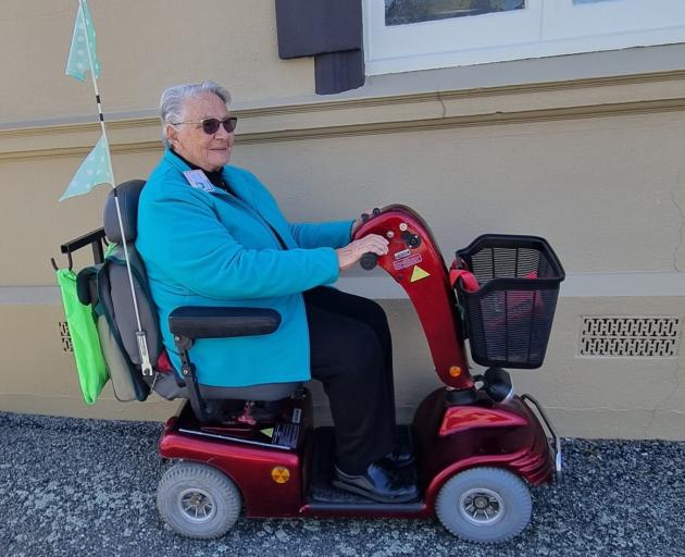 Erin Farrant regularly rides her mobility scooter to Age Concern’s Friday Club. PHOTO: SUPPLIED