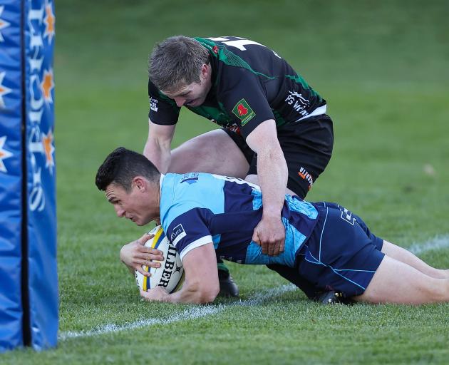Wakatipu’s James Valentine ‘scores’ a try against Alexandra, however the ref ruled he’d been held...