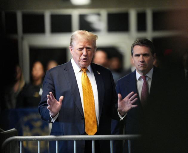 Former US President Donald Trump compared himself to Mother Teresa as the jury began their...