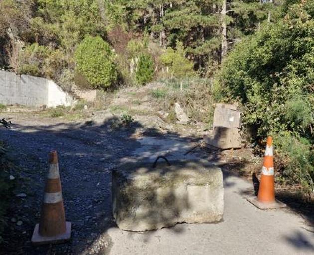 City council staff blocked off the entrance to 8 Virginia Lane on May 2 in an effort to prevent...