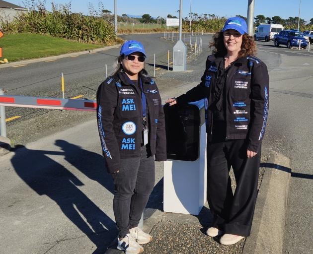 Kris Benipayo (left) and Julie Jack with new ticketless car parking machines at ...