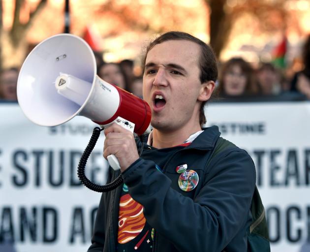 Neave Ashton leading the protest to the clocktower. PHOTO: GREGOR RICHARDSON