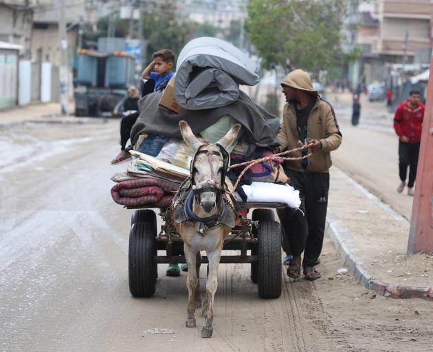 Palestinians are fleeing Rafah as the Israeli army announced it took control of the Palestinian...