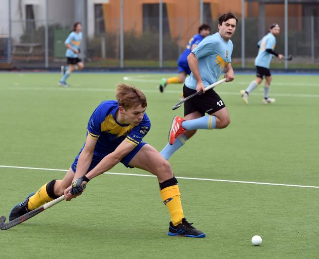Baxter Meder looks to pass the ball during the Taieri Tuataras’ match against University Whales...