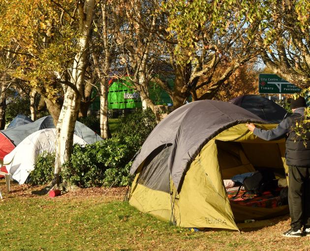 Homeless people living in tents at the edge of the Oval in Dunedin were visited by housing...