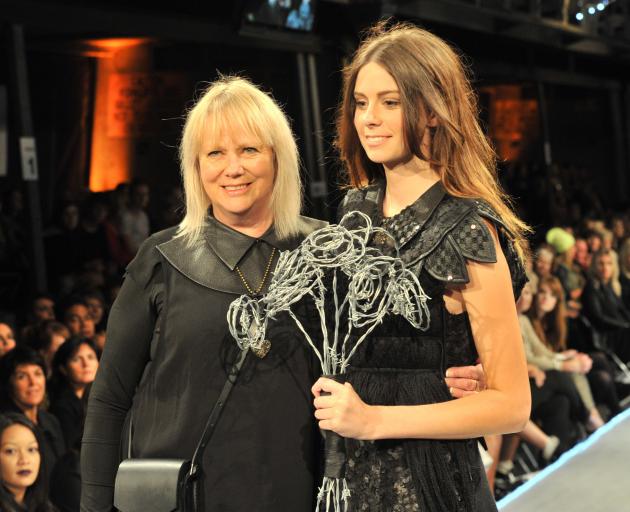 Mild Red designer Donna Tulloch (left) with a model at the finale of the 2013 iD Fashion Show....
